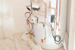 An electric system boiler and unvented cylinder installation.