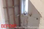 Understairs cupboard converted into a bathroom.