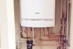 Old combi boiler replaced with a baxi with a new vertical flue installed.