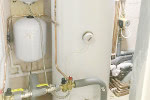 Unvented hot water cylinders replacing old open vented cylinders with a secondary return.