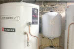 Unvented hot water cylinders replacing old open vented cylinders with a secondary return.