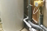 Unvented hot water cylinders replacing old open vented cylinders with a secondary return.